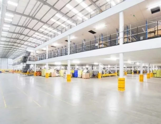 Custom steel mezzanine floor with stair access